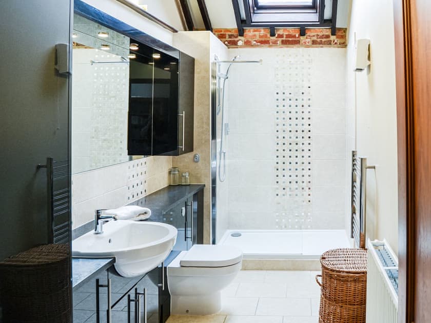 The main bathroom, Huge mirror, a great place to pamper yourself and even has underfloor heating | Lodge Farm Barn, South Walsham