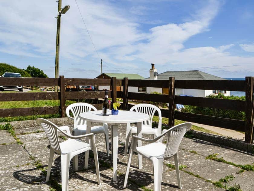 Sitting-out-area | The Chalet - Hunmanby Gap Cottages, Hunmanby Gap, near Filey
