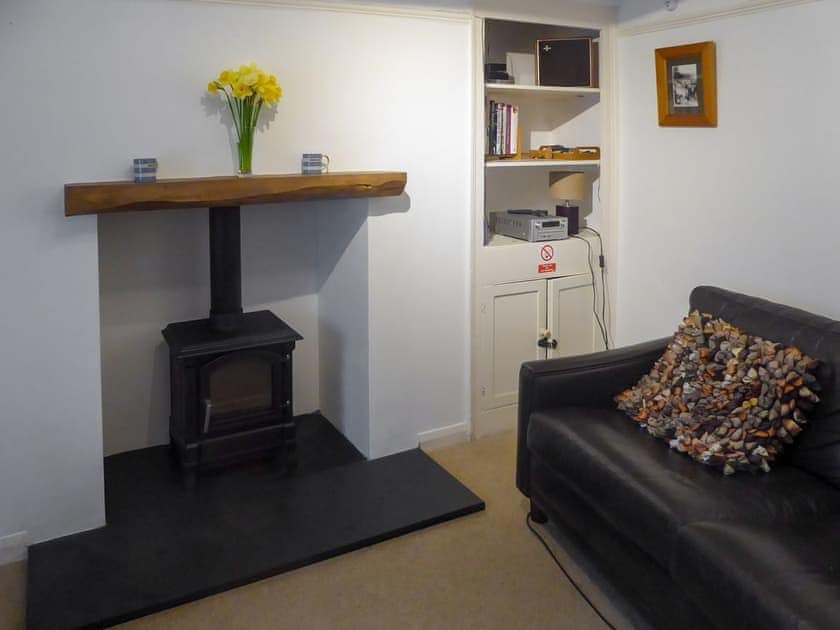 Cosy living room with wood burner | May Cottage, Tywardreath, near Fowey