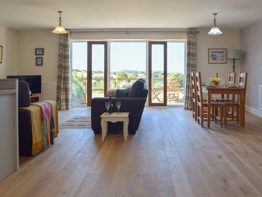 Open plan living space | The Retreat - Castle View, Roch, near Newgale