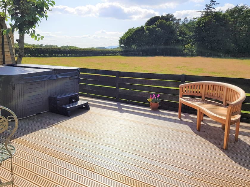 Beautiful views from the private decking area | Trebor Cottage, Annan, near Dumfries