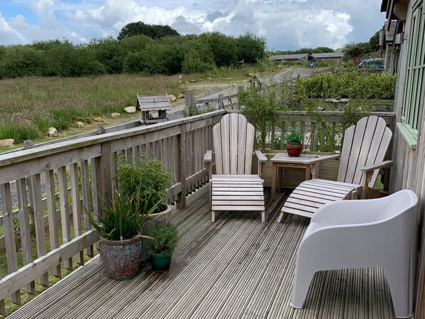Front deck seating area | Meadowside Lodges- Peregrine Lodge - Meadowside Lodges, St Columb, near Padstow