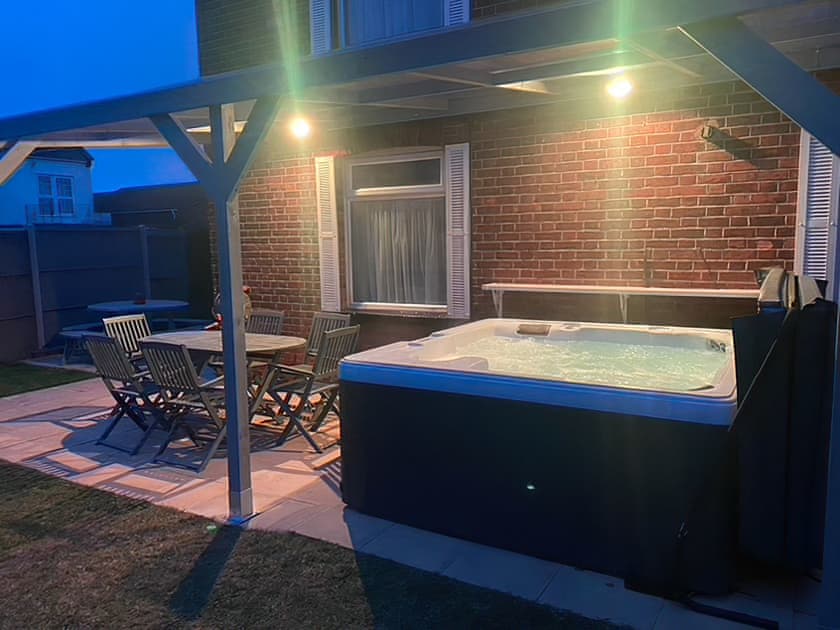 Hot tub area illuminated | Coastguard Cottage, Caister-on-Sea, near Great Yarmouth