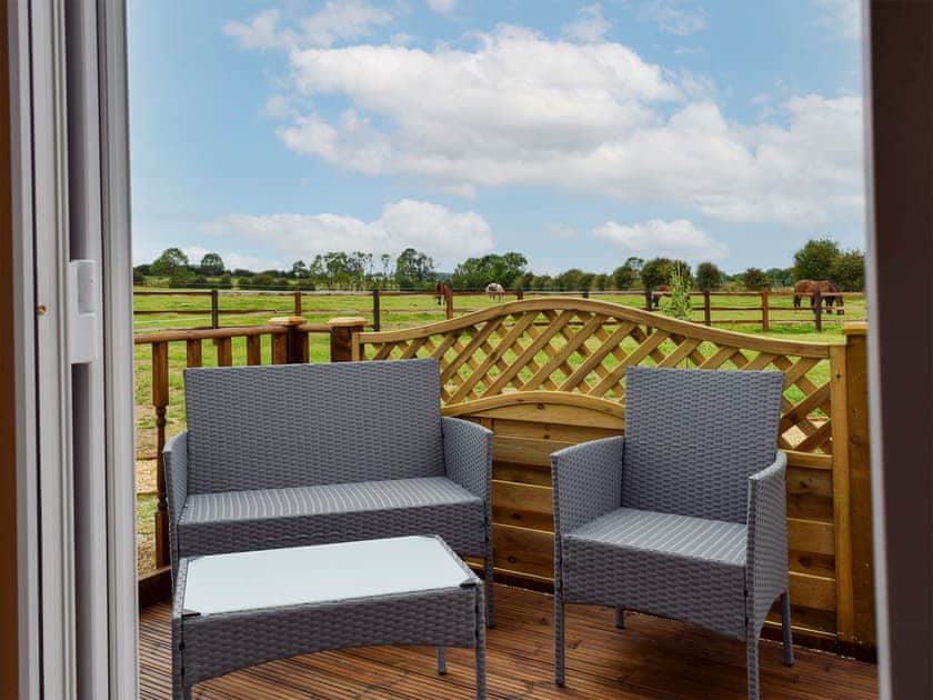 Sitting-out-area | Pheasant Lodge - Coplow Cabins, Billesdon, near Leicester