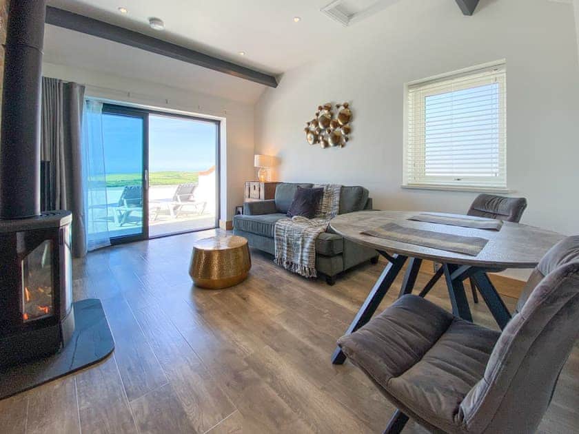 Living room/dining room | Woolbarn - Wooldown Holiday Cottages, Marhamchurch, near Bude