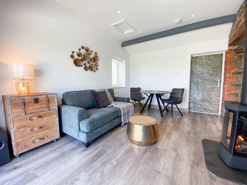 Living room/dining room | Woolbarn - Wooldown Holiday Cottages, Marhamchurch, near Bude