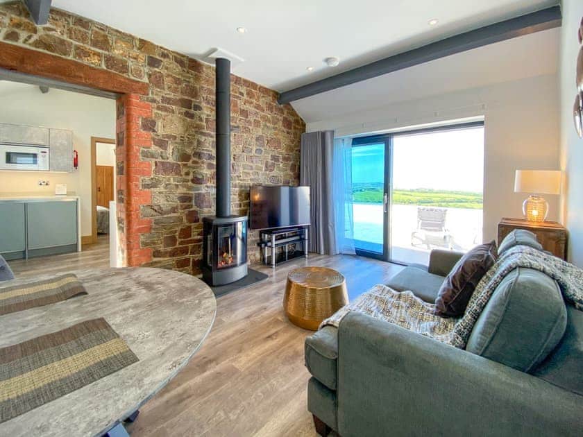 Living room/dining room | Woolbarn - Wooldown Holiday Cottages, Marhamchurch, near Bude