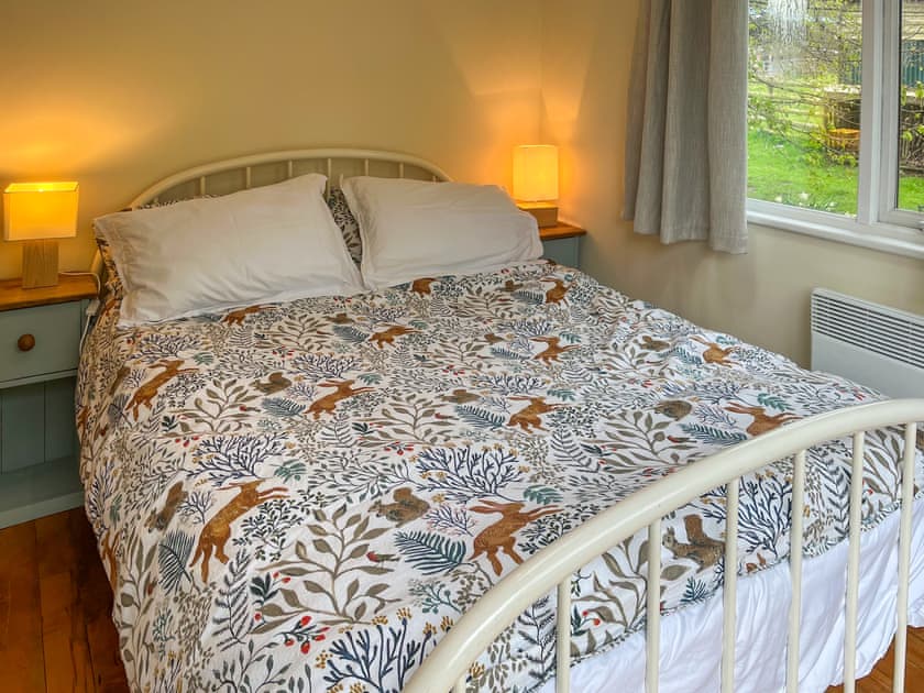 Main bedroom with a double bed | Drumble Lodge, Newbold Astbury, Congleton