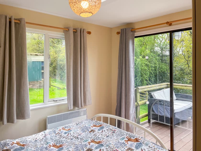 View over the rear balcony from the main bedroom | Drumble Lodge, Newbold Astbury, Congleton