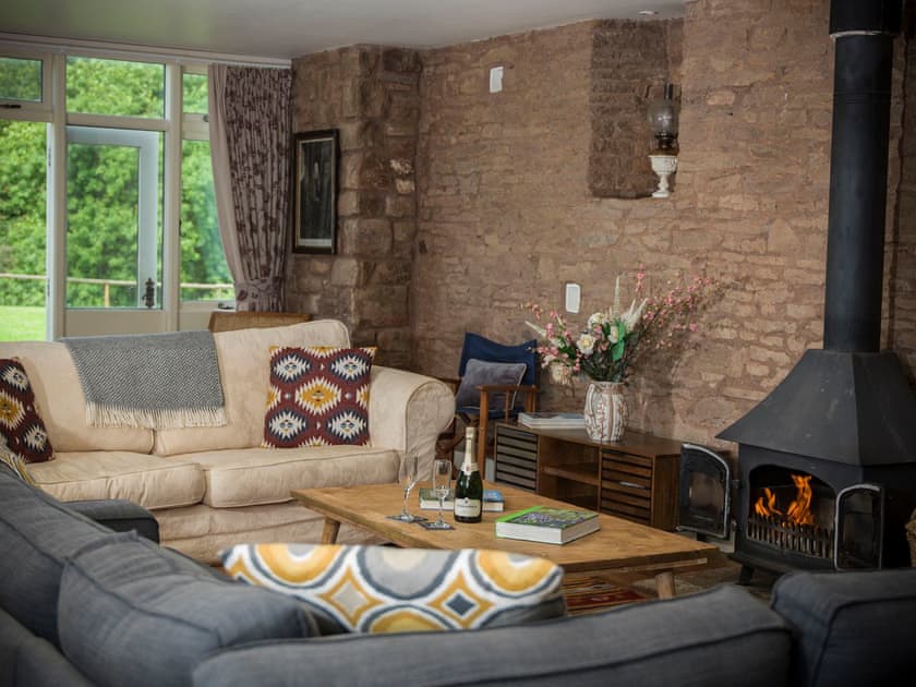 Generous and cosy sitting room | Lodge Barn, Aylburton, near Lydney