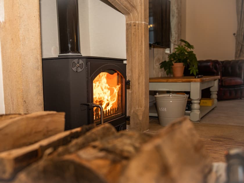 Wonderfully cosy woodburner, for warming those winter nights. Kindling and logs provided | Crickledown, High Ham, Langport