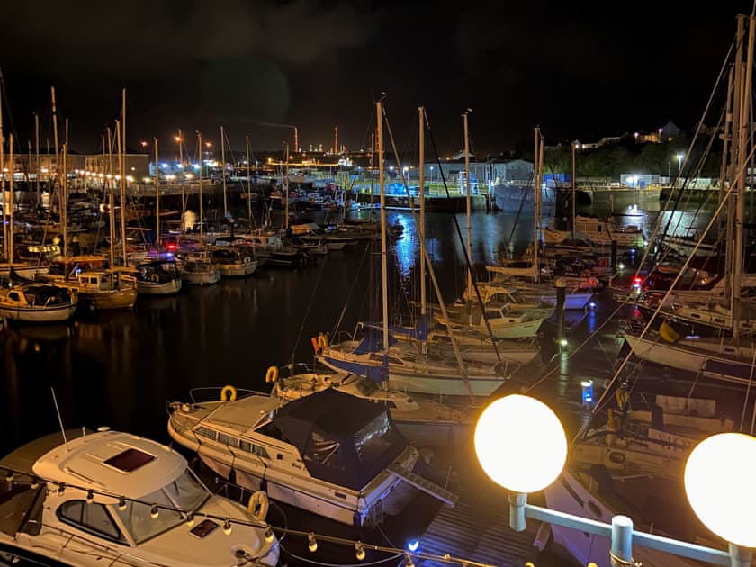 Milford waterfront at night from suite 1 | Suite 1 at Victory House, Milford Haven