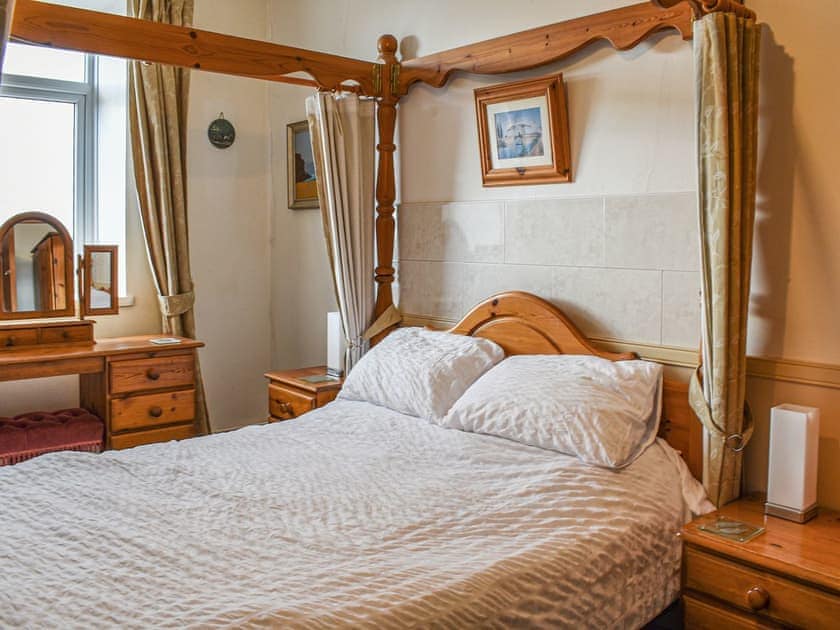Four Poster bedroom | King Arthur Suite, Trearddur Bay