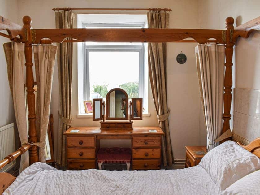 Four Poster bedroom | King Arthur Suite, Trearddur Bay
