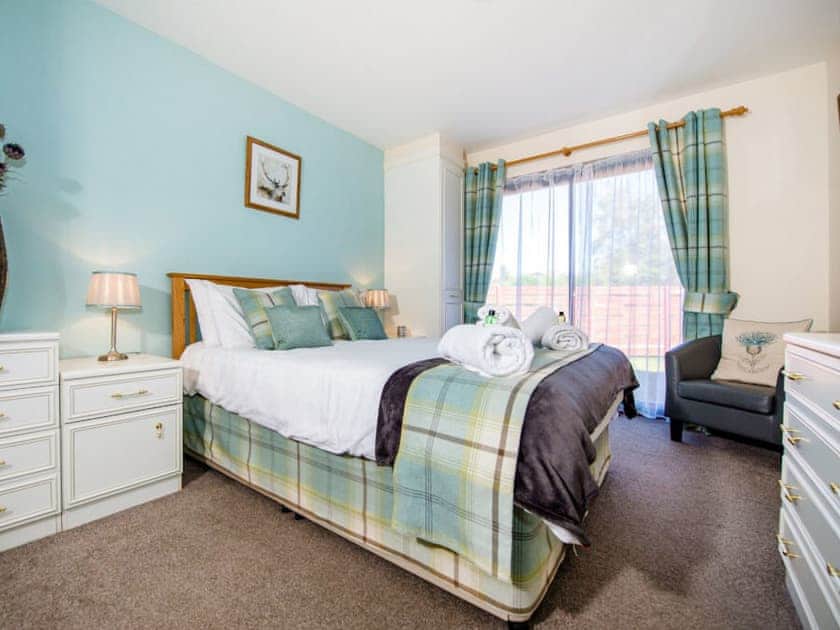 Double bedroom | The Stag - Silverglades Holiday Homes, Aviemore