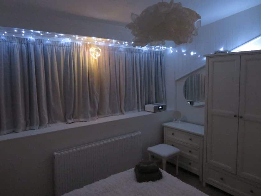 Cosy evenings in the double bedroom | Sea View, Deganwy, near Llandudno