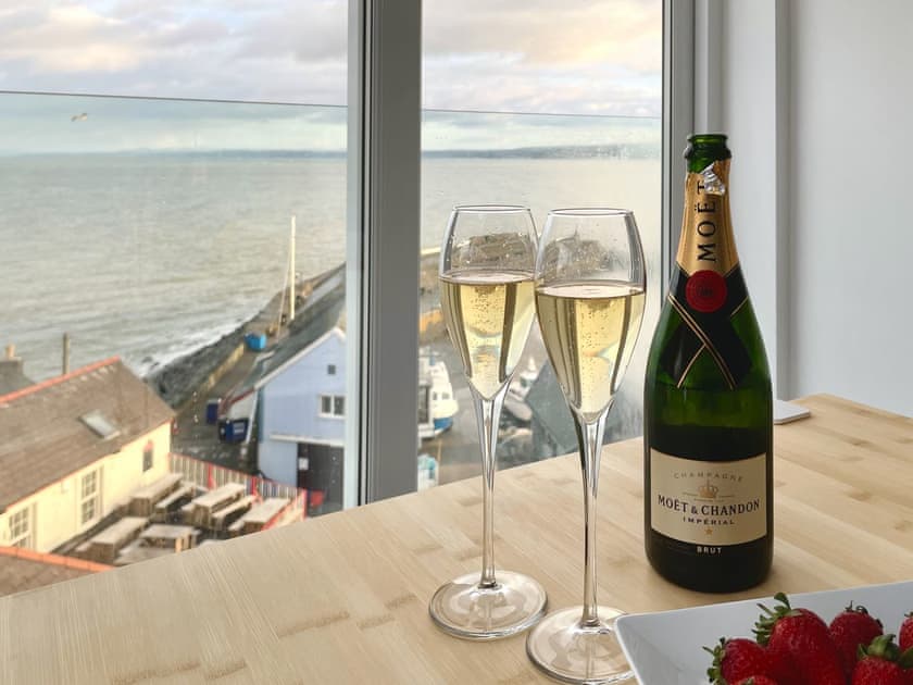 Charming dining area with wonderful harbour and sea views | Seascape, New Quay
