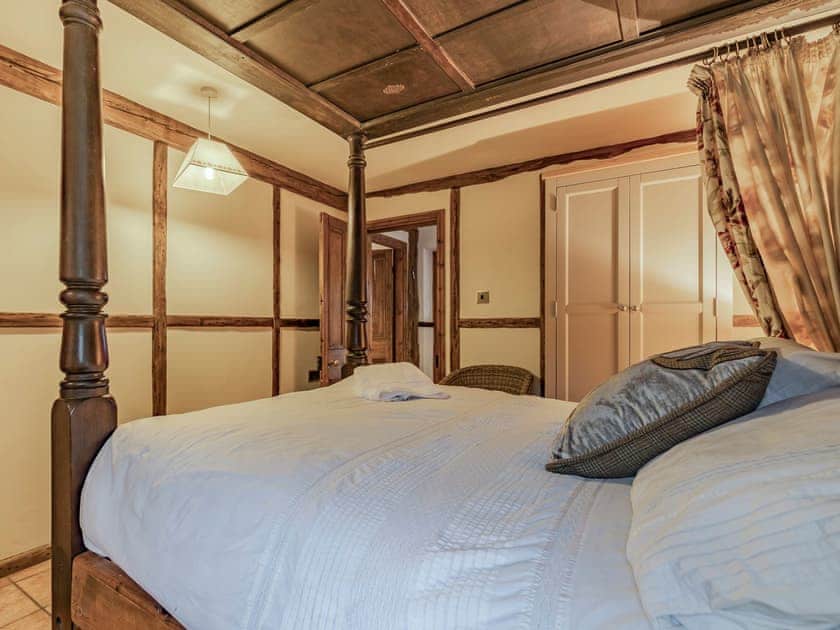 Four Poster bedroom | The Stable - Domvilles Farm, Audley