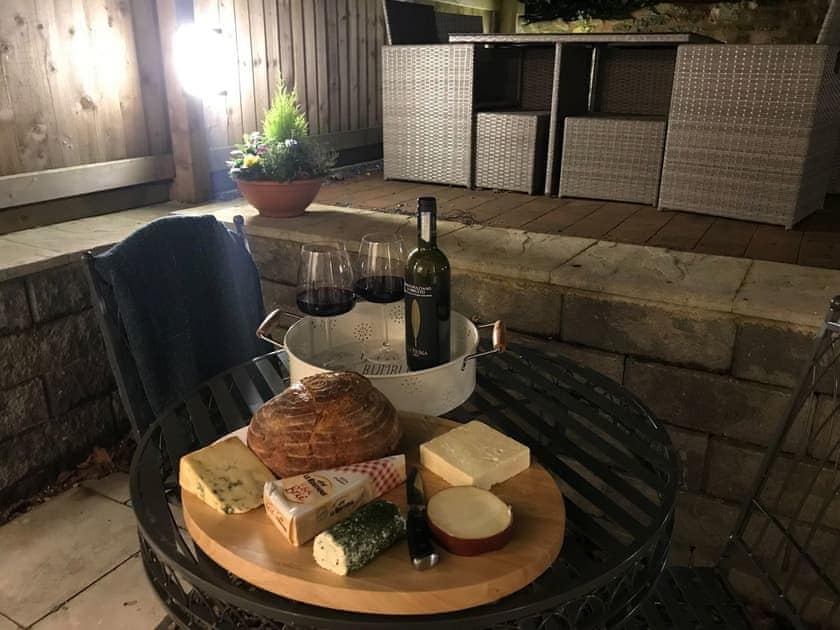 Garden outdoor seating | Clock Tower Cottage, Whitchurch