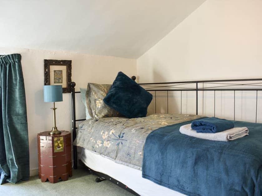 Single bedroom with extra trundle bed underneath of needed situated on first floor  | Robsons Cottage, Alston