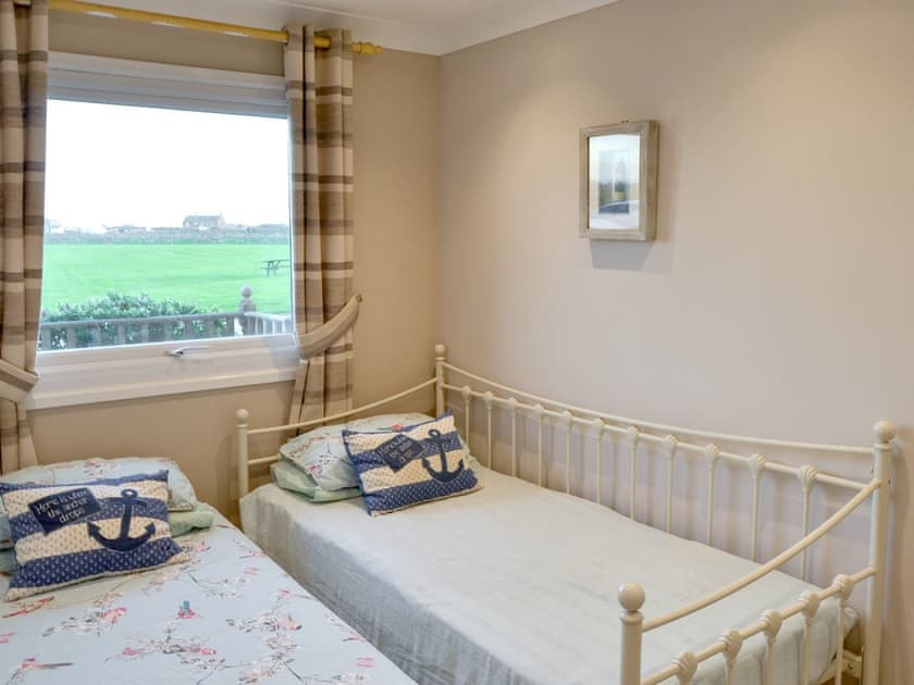 Single bedroom with pull out extra bed - set as twin | On The Beach, Bacton