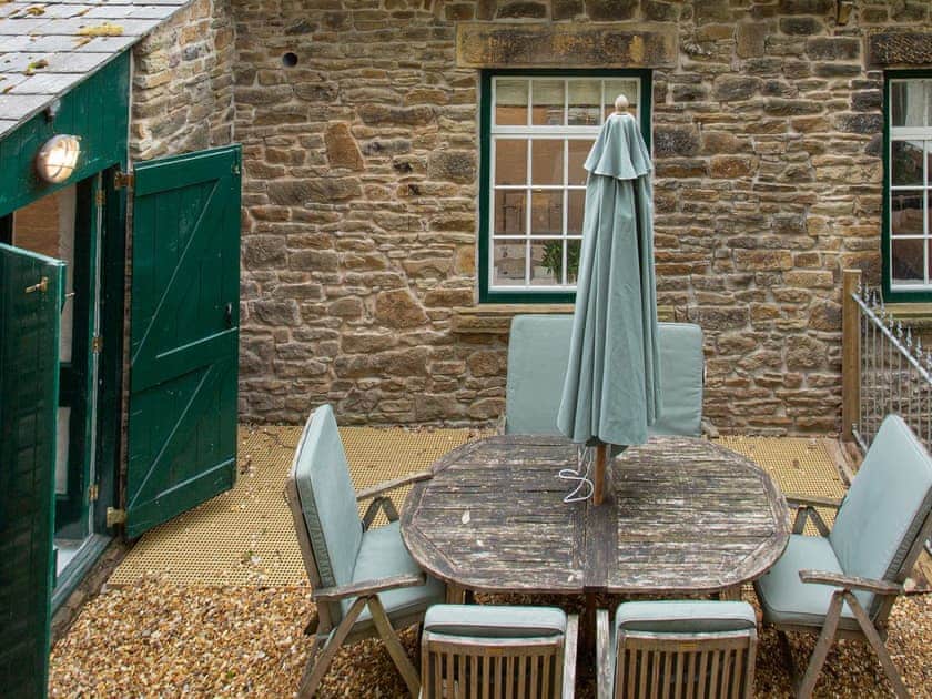 Sitting-out-area | The Old Workshop - Lowes Mill Cottages at Torr Vale Mill, New Mills