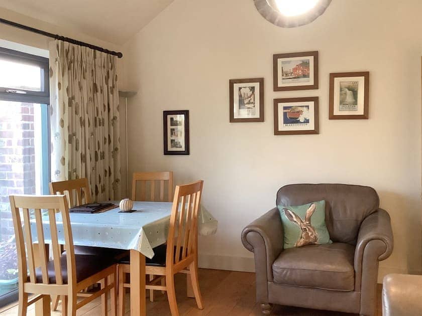 Dining area of living and dining room | Rusty’s Cottage - Wisteria and Rusty’s Cottages, Buttercrambe, near York