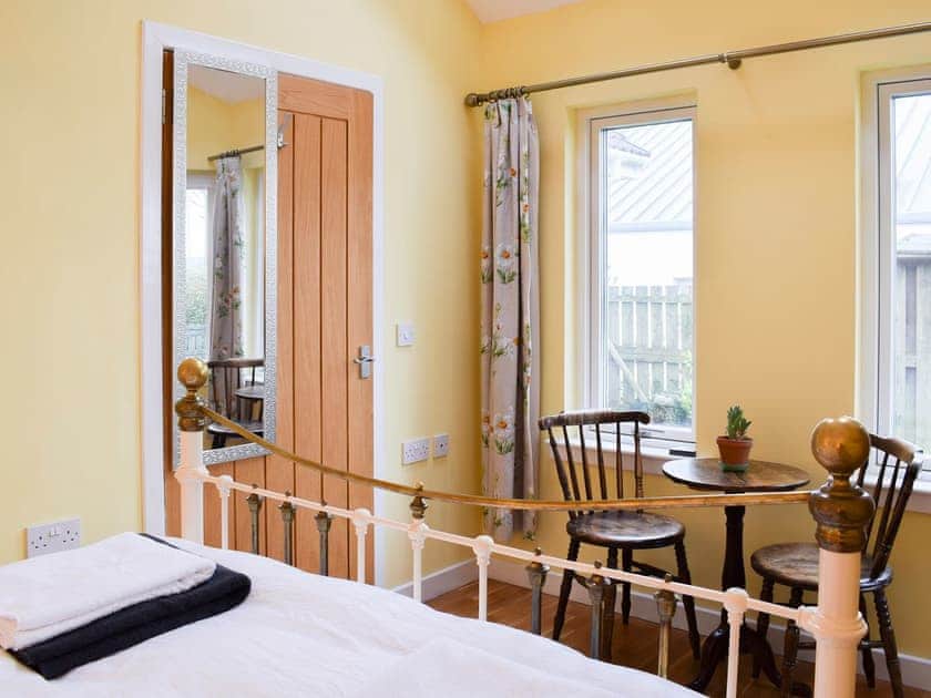 King size bedroom | Puddingstone Cottage, Gartmore