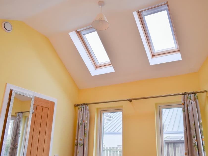 King size bedroom | Puddingstone Cottage, Gartmore