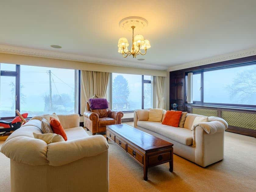 Living room | Orchard Lodge - Orchard Holidays, Woolaston, near Forest of Dean