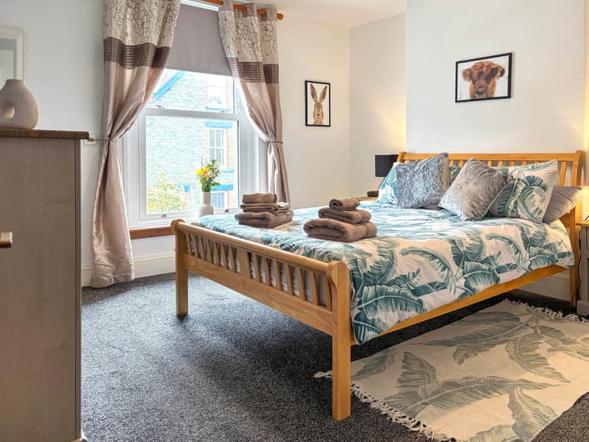 Welcoming double bedroom with walk in wardrobe | Lavender Cottage, Keswick