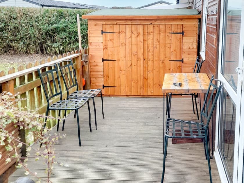 Decking area with storage shed | The Revie, Bridlington