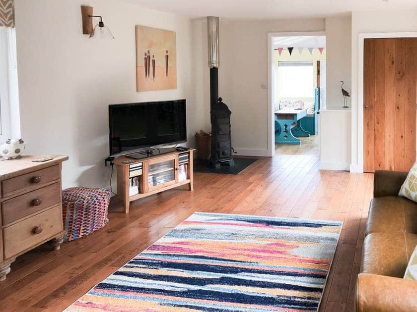 Large living room with wood burning stove | The Gallery, Portmellon, near Mevagissey