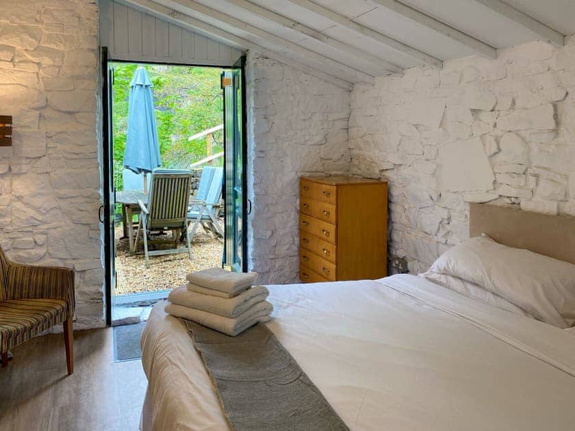 Double bedroom | The Old Workshop - Lowes Mill Cottages at Torr Vale Mill, New Mills