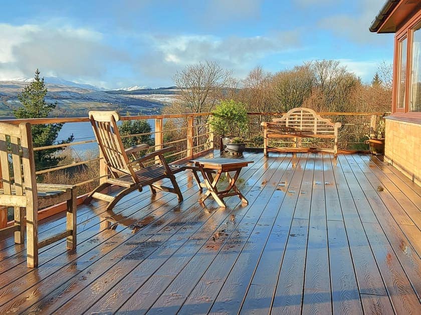Large area of decking with view over loch and hills to the West | Rosmuire, Shandon, near Helensburgh