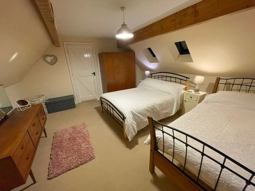 Family bedroom with a double and a single bed | Beech Cottage - Cysgod Y Coed Cottages, Llanrhaeadr, near Denbigh