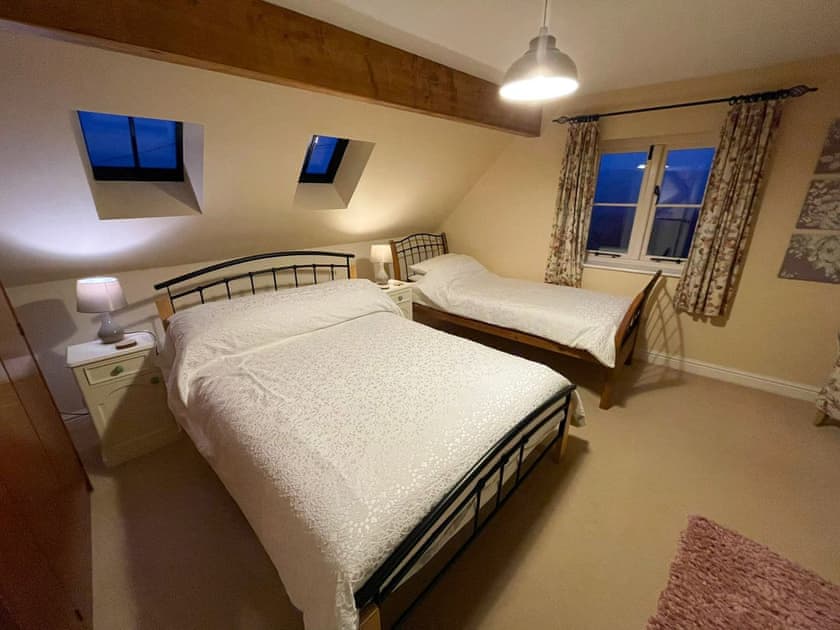 Family bedroom with a double and a single bed | Beech Cottage - Cysgod Y Coed Cottages, Llanrhaeadr, near Denbigh