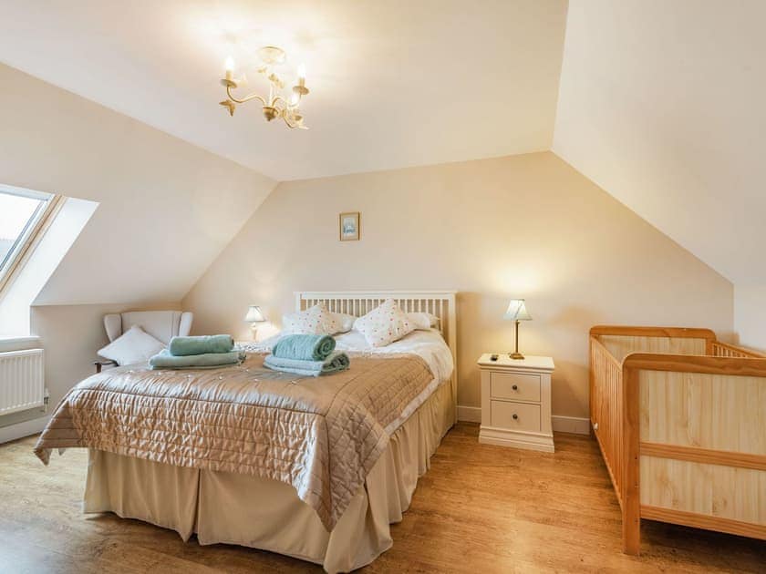King bedroom | Y Beudy - Penrhyn Farm Cottages, Llanfwrog, near Holyhead