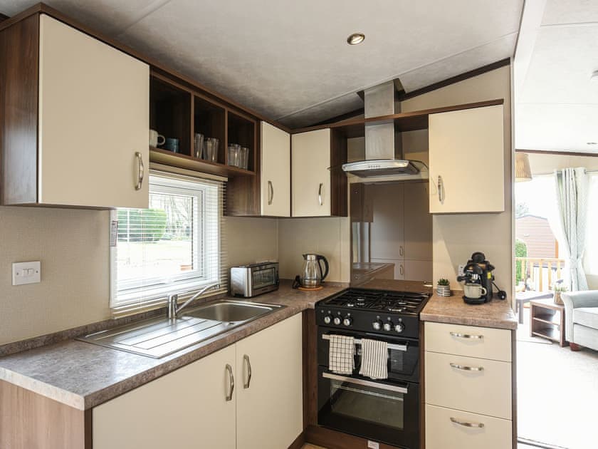 Kitchen area | Avon Lodge - Daisy Bank Touring Caravan Park, Montgomery