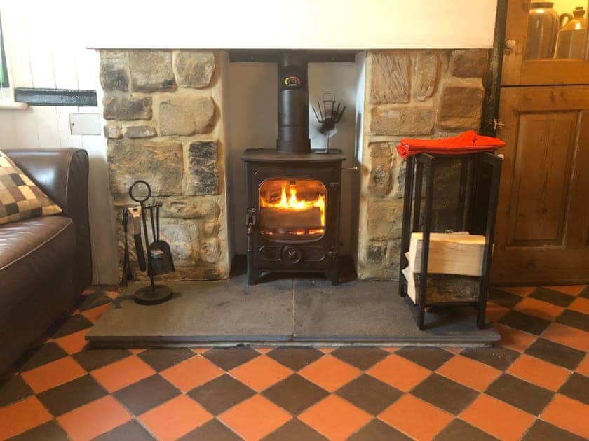 Woodburner in the living area | Castleton House, Staithes, near Whitby