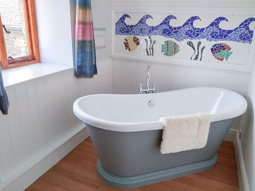 Bathroom with standalone slipper bath | Trescowthick Barn, St Newlyn, near Newquay