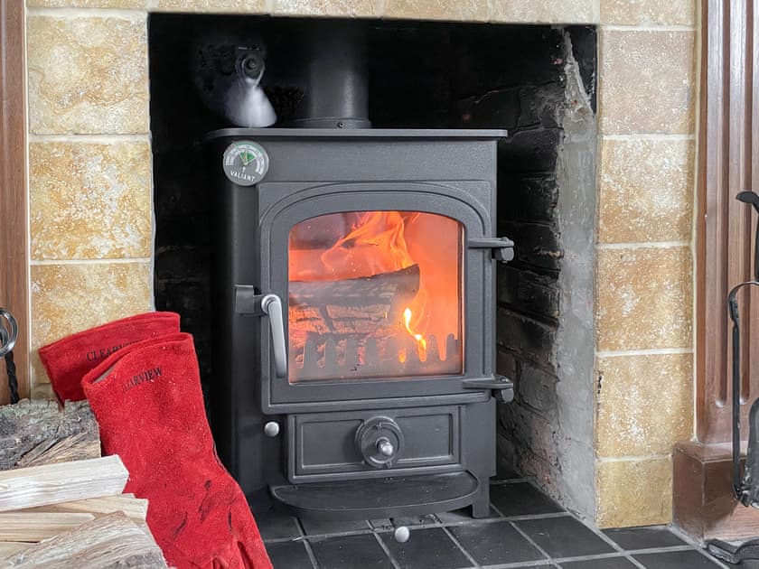 Comfortable living room with log-burner  | The Bothy, Lymington