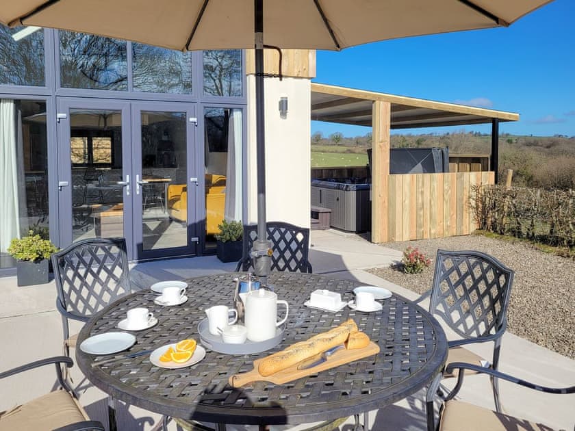 Sitting-out-area | Red Kite Lodge - Red Kite Holidays, Tregaron, near Aberystwyth