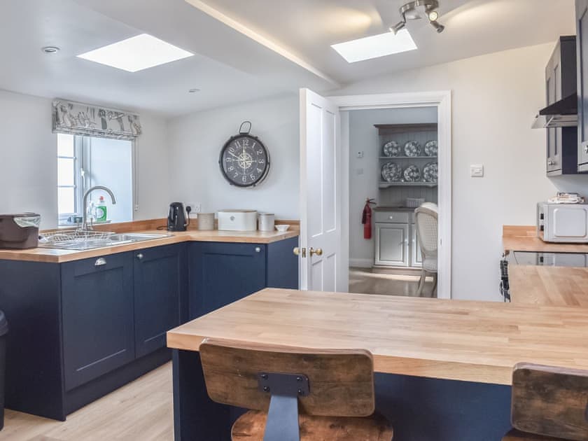 Kitchen area | Crogen Gatehouse Lodge, Corwen