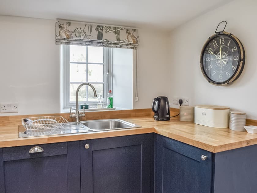 Kitchen area | Crogen Gatehouse Lodge, Corwen