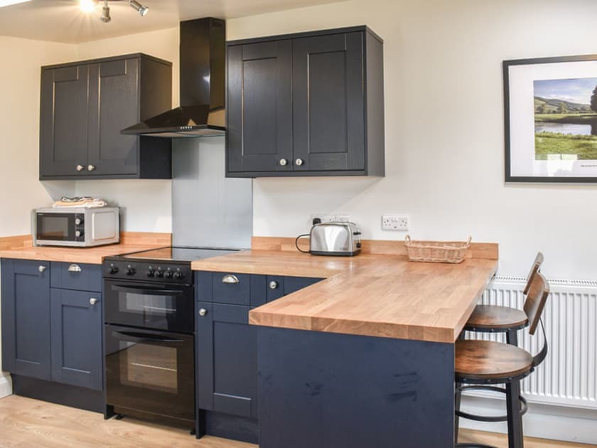 Kitchen area | Crogen Gatehouse Lodge, Corwen