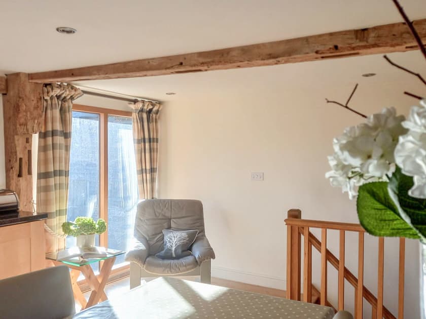 A sunny spot for reading overlooking the courtyard | The Barn at Titley, Titley, near Kington
