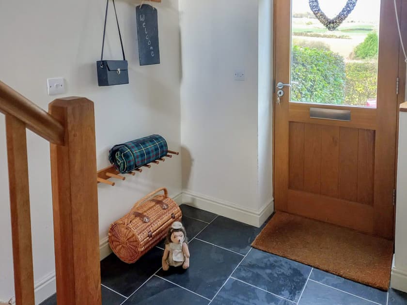 the hall with views out to open fields and forests | The Barn at Titley, Titley, near Kington