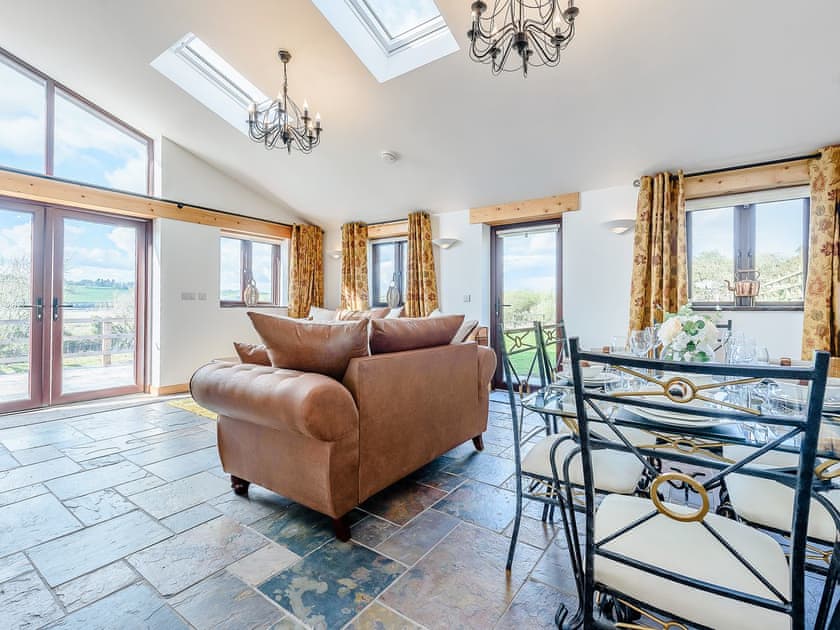 Living room/dining room | The Coach House - Bronyn Farm, Ferryside, near Carmarthen