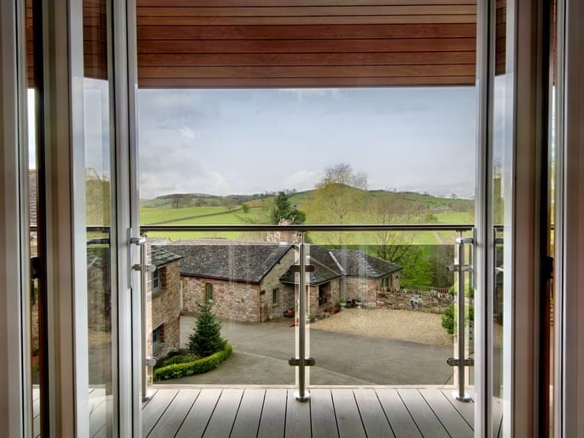 Access from living area to terrace | Woodhouse Lodge, Pooley Bridge, Ullswater